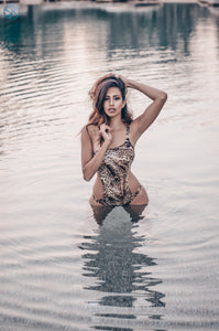 Brunette Curvy Egyptian Model in Tiger Swimwear Posing In A Pond
