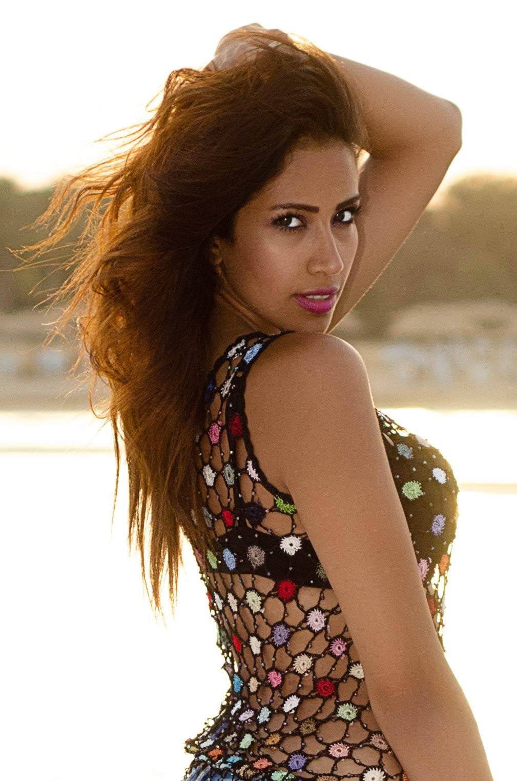 Egyptian Brunette Model Posing To Camera On Beach Bridge With Bronze M –  Randa Eissa