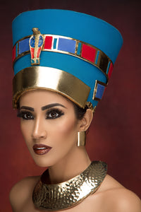 Egyptian Queen Nefertiti Costume Female Model Fierce With Make Up And Ancient Crown With Brown Wallpaper Background