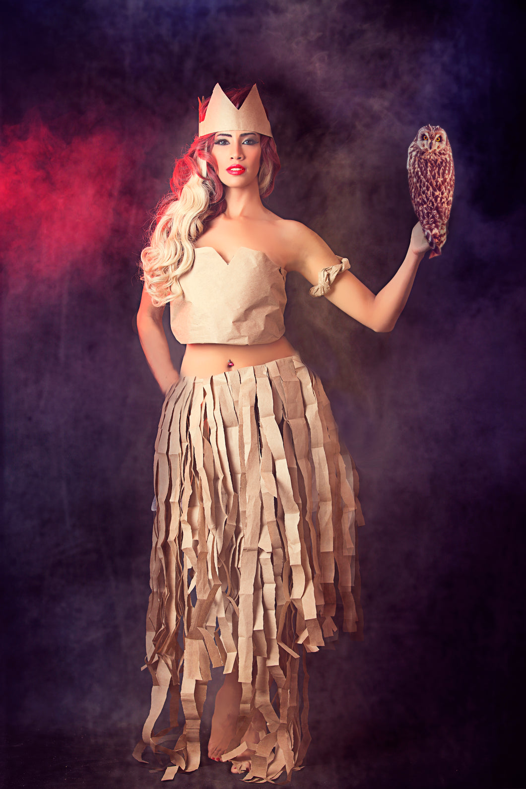 Female Model Wearing Cool Handmade Designed Paper skirt and shirt nice outfit o a dark wall background